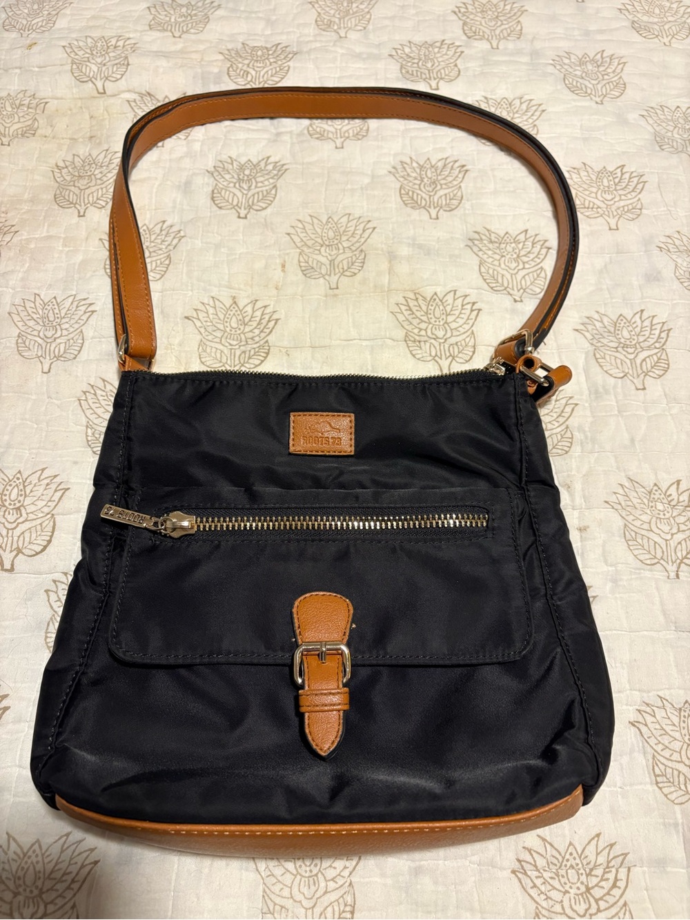 Roots Black Crossbody Bag with Brown Trim